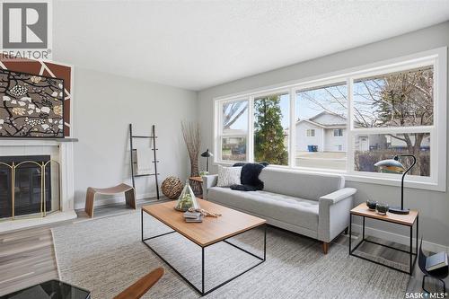 1721 E Avenue N, Saskatoon, SK - Indoor Photo Showing Living Room With Fireplace