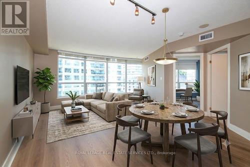 Virtually staged Living Room and Dining Room - 707 - 550 Queens Quay W, Toronto, ON - Indoor Photo Showing Dining Room