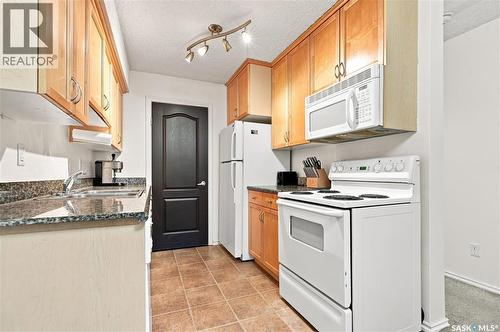 108G 1121 Mckercher Drive, Saskatoon, SK - Indoor Photo Showing Kitchen With Double Sink