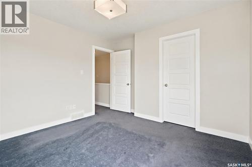 101 3229 Elgaard Drive, Regina, SK - Indoor Photo Showing Other Room