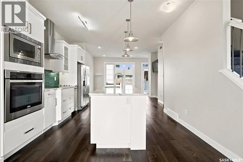 101 3229 Elgaard Drive, Regina, SK - Indoor Photo Showing Kitchen With Upgraded Kitchen