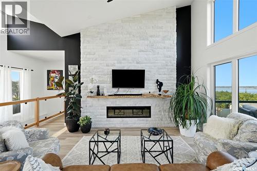 232 Edgewood Drive, Buena Vista, SK - Indoor Photo Showing Living Room With Fireplace