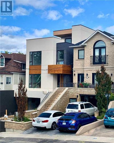 201 - 15 ENNERDALE ROAD , Toronto, Ontario M6E 4C2