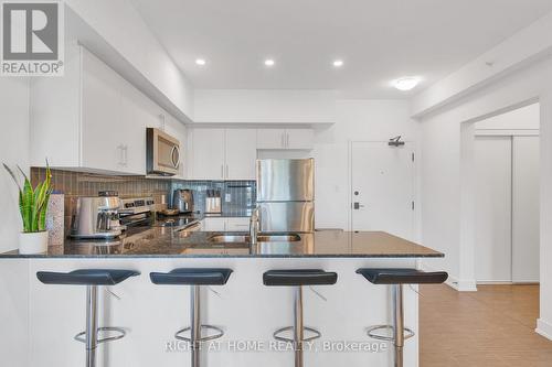 507 - 4 Spice Way, Barrie, ON - Indoor Photo Showing Kitchen With Upgraded Kitchen