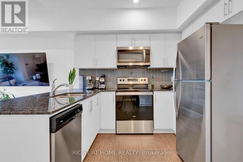507 - 4 Spice Way, Barrie, ON - Indoor Photo Showing Kitchen With Stainless Steel Kitchen With Upgraded Kitchen