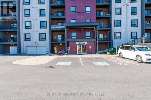 507 - 4 Spice Way, Barrie, ON - Outdoor With Balcony With Facade