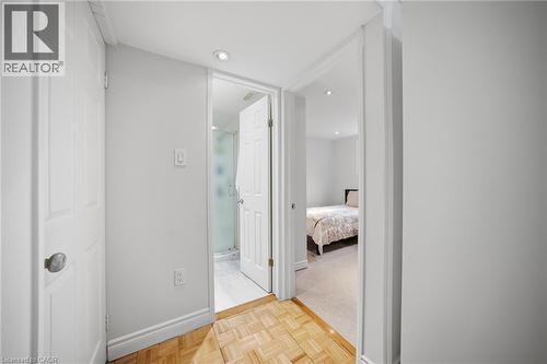Modern ensuite bathroom featuring a frameless glass shower enclosure with chrome hardware, white subway tile surround, recessed ceiling lighting, and direct access to the bedroom - 6346 Neuchatel Road, Mississauga, ON - Indoor
