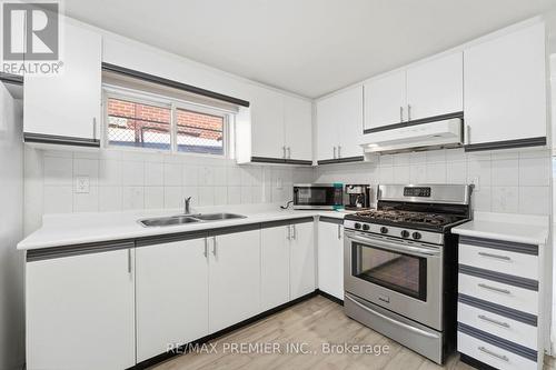 15 Madonna Gardens, Toronto, ON - Indoor Photo Showing Kitchen With Double Sink