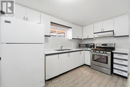 15 Madonna Gardens, Toronto, ON - Indoor Photo Showing Kitchen With Double Sink