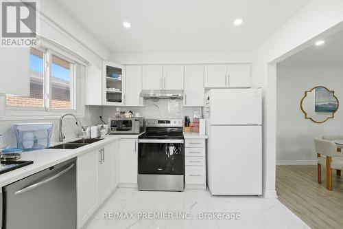 15 Madonna Gardens, Toronto, ON - Indoor Photo Showing Kitchen With Double Sink