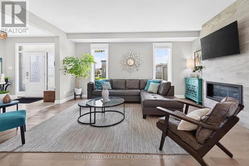 595 Decoeur Drive, Ottawa, ON - Indoor Photo Showing Living Room With Fireplace
