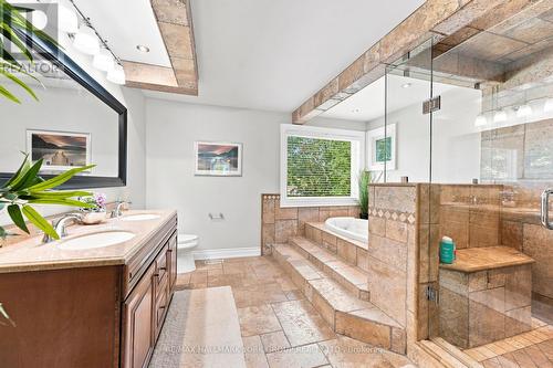 Large jacuzzi soaker tub with fireplace - 111 Whispering Pine Trail, Aurora, ON - Indoor Photo Showing Bathroom