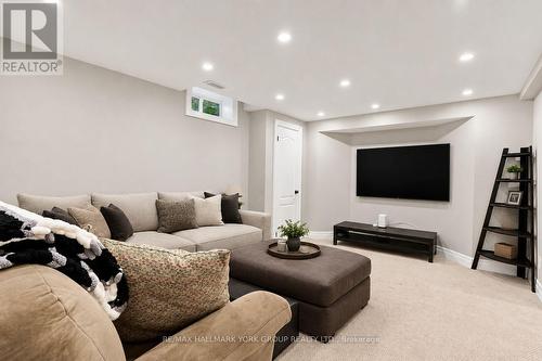 Media room in basement (virtually staged) - 111 Whispering Pine Trail, Aurora, ON - Indoor