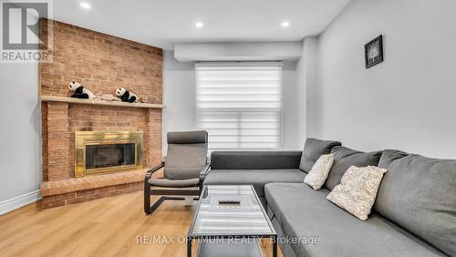 362 Kingsbridge Garden Circle, Mississauga, ON - Indoor Photo Showing Living Room With Fireplace