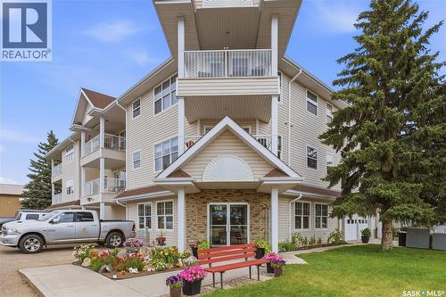 205 100 5Th Avenue, Regina Beach, SK - Outdoor With Balcony With Facade