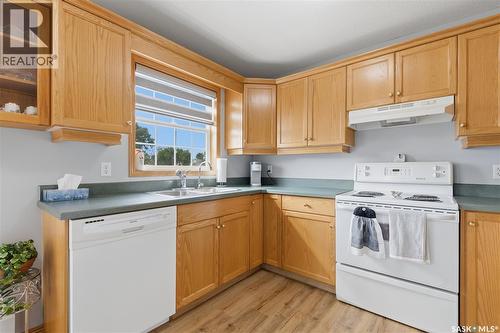 205 100 5Th Avenue, Regina Beach, SK - Indoor Photo Showing Kitchen With Double Sink
