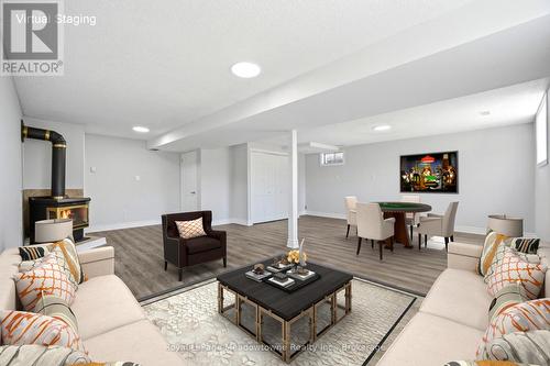 Virtually Staged - 680 Raglan Street, Minto (Palmerston), ON - Indoor Photo Showing Living Room