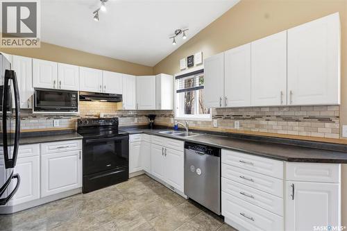 201 1St Avenue N, Warman, SK - Indoor Photo Showing Kitchen With Double Sink