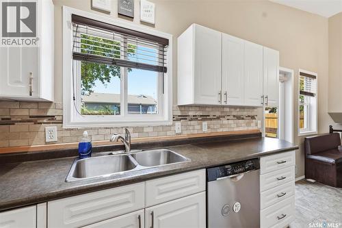 201 1St Avenue N, Warman, SK - Indoor Photo Showing Kitchen With Double Sink