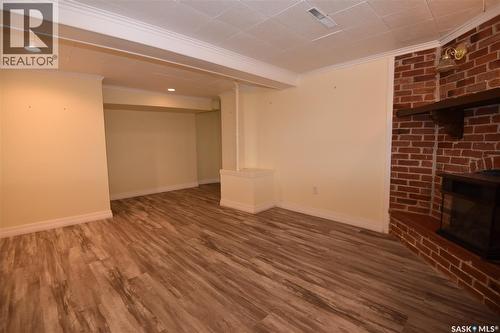 207 Pine Avenue, Nipawin, SK - Indoor Photo Showing Other Room With Fireplace