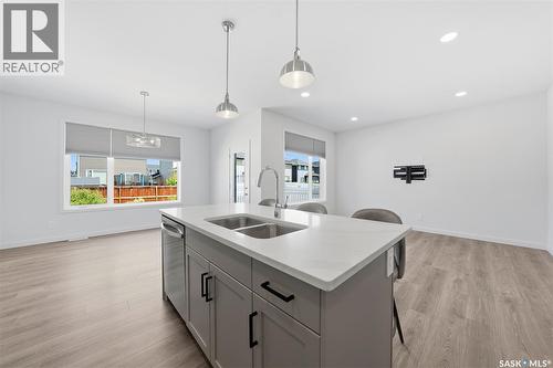 377 Germain Manor, Saskatoon, SK - Indoor Photo Showing Kitchen With Double Sink