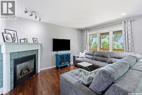 217 Isabella Street E, Saskatoon, SK - Indoor Photo Showing Living Room With Fireplace
