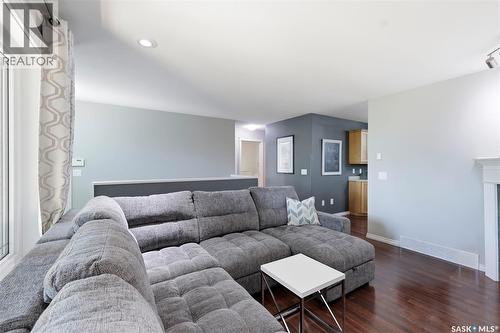 217 Isabella Street E, Saskatoon, SK - Indoor Photo Showing Living Room With Fireplace