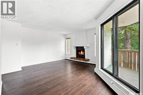301 116 111Th Street, Saskatoon, SK - Indoor With Fireplace