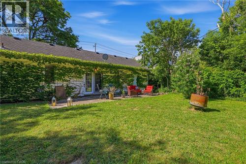 Expansive backyard featuring a manicured lawn and mature trees - 356 Thompson Road, London, ON - Outdoor