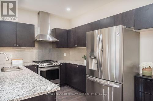 1079 Job Crescent, Milton, ON - Indoor Photo Showing Kitchen With Stainless Steel Kitchen With Double Sink With Upgraded Kitchen