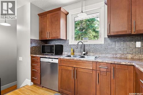 23 Price Crescent, Regina, SK - Indoor Photo Showing Kitchen With Double Sink