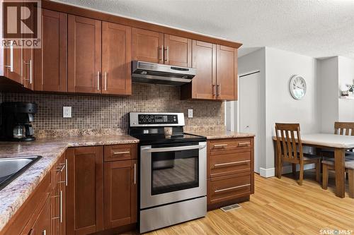 23 Price Crescent, Regina, SK - Indoor Photo Showing Kitchen With Upgraded Kitchen