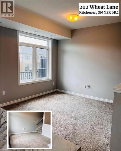 Spacious bedroom featuring neutral wall finishes, carpeted flooring, large double-hung window with operator shade, and abundant natural light - 202 Wheat Lane, Kitchener, ON - Indoor Photo Showing Other Room