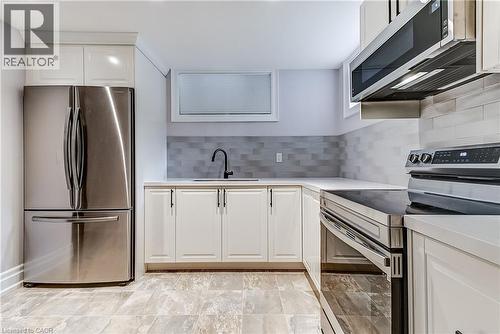 1569 Wembury Road, Mississauga, ON - Indoor Photo Showing Kitchen With Upgraded Kitchen