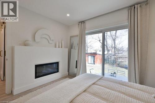 75 Rangoon Road, Toronto, ON - Indoor Photo Showing Bedroom With Fireplace