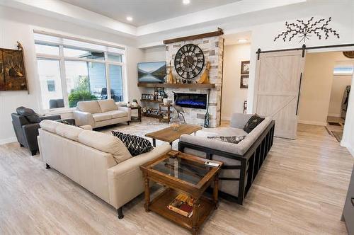 23 Amherst Dr, Pinawa, MB - Indoor Photo Showing Living Room With Fireplace