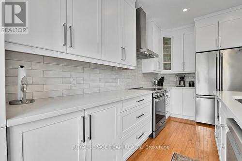 Quartz counters and linear tile backsplash - 4121 Wolfe Point Way, Ottawa, ON - Indoor Photo Showing Kitchen With Upgraded Kitchen