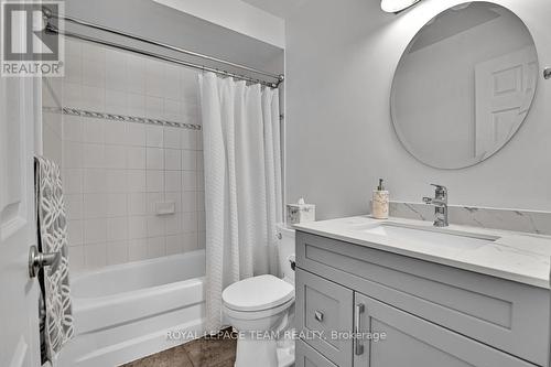 Main bath updated with new vanity & toilet - 4121 Wolfe Point Way, Ottawa, ON - Indoor Photo Showing Bathroom