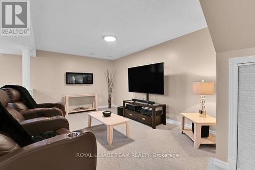 Perfect place for teens or family time - 4121 Wolfe Point Way, Ottawa, ON - Indoor With Fireplace