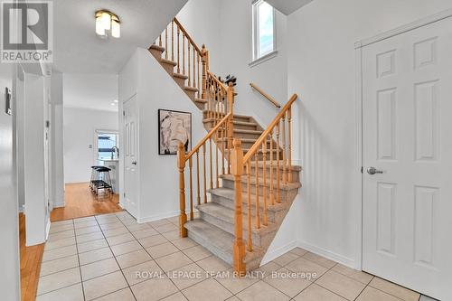 Foyer has access to garage & powder room - 4121 Wolfe Point Way, Ottawa, ON - Indoor Photo Showing Other Room
