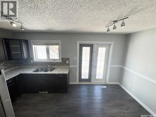 2907 Jenkins Drive E, Regina, SK - Indoor Photo Showing Kitchen With Double Sink