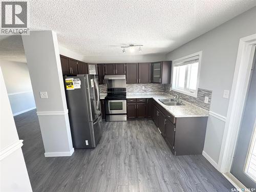 2907 Jenkins Drive E, Regina, SK - Indoor Photo Showing Kitchen With Double Sink