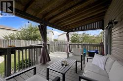 Covered outdoor deck with string lighting - 