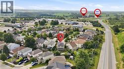 Aerial perspective of a residential neighborhood with detached homes - 