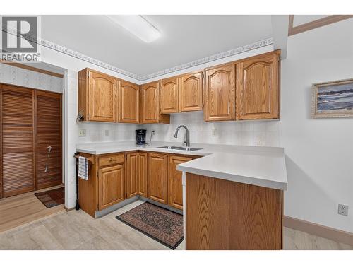 1229 Bernard Avenue Unit# 102, Kelowna, BC - Indoor Photo Showing Kitchen With Double Sink