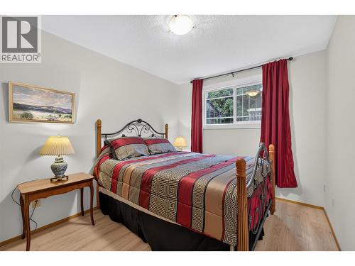 1229 Bernard Avenue Unit# 102, Kelowna, BC - Indoor Photo Showing Bedroom