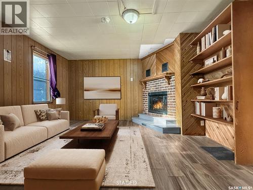 359 6Th Avenue Se, Swift Current, SK - Indoor Photo Showing Living Room With Fireplace