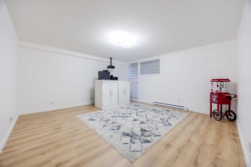 Salle familiale - 9935 Rue Riverin, Brossard, QC - Indoor Photo Showing Other Room