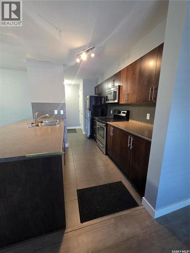 110 306 Petterson Drive, Estevan, SK - Indoor Photo Showing Kitchen With Double Sink