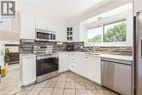 364 Fennell Avenue W, Hamilton, ON - Indoor Photo Showing Kitchen With Double Sink